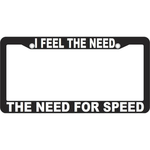 Black license plate frame with the text 'I FEEL THE NEED - THE NEED FOR SPEED' in white letters.