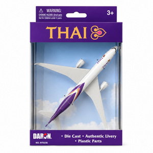 Thai Airways die-cast metal airplane model in its original retail packaging by Daron. The white and purple airplane is displayed inside a clear plastic window box with a purple header and footer card.