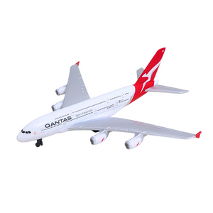 A white and red Qantas Airbus A380 toy model airplane on a plain white background.