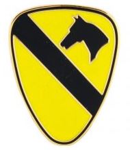 A shield-shaped calvary pin with a yellow background, a black horse silhouette, and a black diagonal stripe.