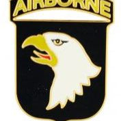 A shield-shaped pin featuring an eagle and the text 'AIRBORNE'.