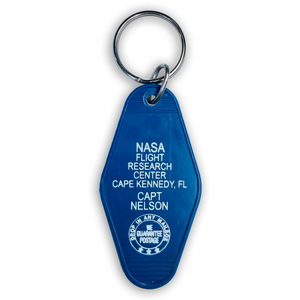 Blue keychain with NASA text on a white background