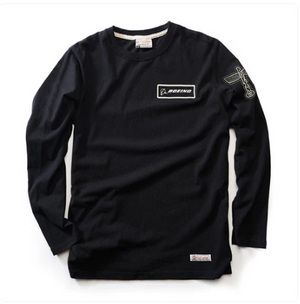Black long-sleeve shirt with branding on a white background