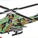 Model helicopter puzzle with camouflage design on a white background