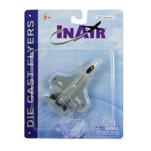 Toy airplane in packaging with 'IN AIR' branding on a blue background