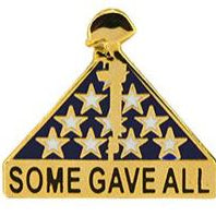 A gold-colored pin with a rifle at the top and a blue field with white stars beneath it, along with the phrase 'SOME GAVE ALL' on a banner.
