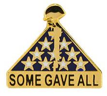 A gold-colored pin with a rifle at the top and a blue field with white stars beneath it, along with the phrase 'SOME GAVE ALL' on a banner.