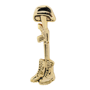 Gold-colored military-themed charm with helmet, rifle, and boots on a white background