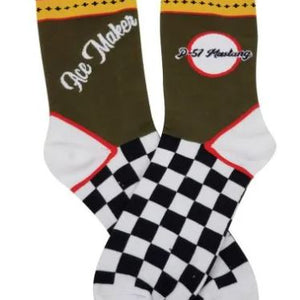 Pair of socks with checkered pattern and text on a white background