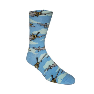 A single crew sock with a light blue background pattern of vintage fighter jets and parachutists, shown on a plain white background.
