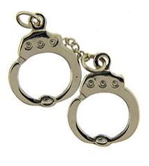 A pair of silver-colored handcuff pins connected by a small chain.