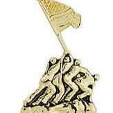 A metal pin with a design depicting a flag being raised, possibly representing Iwo Jima 