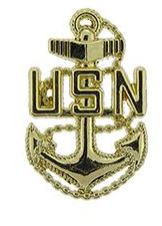 A gold-colored pin with the letters 'USN' and an anchor symbol, representing a US Navy Chief Petty Officer.