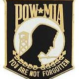 A pin with a gold and black color scheme featuring the silhouette with the text 'POW-MIA YOU ARE NOT FORGOTTEN'.