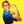 Iconic image of a woman with a red bandana flexing her arm on a yellow background