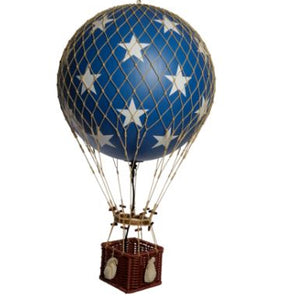 Hot air balloon model with blue fabric and star patterns on a white background