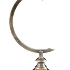 Decorative metal stand with curved arm and base on a white background