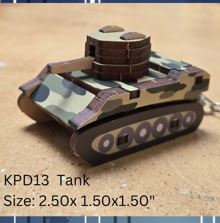 Small die cut wood tank with camouflage design on a textured surface