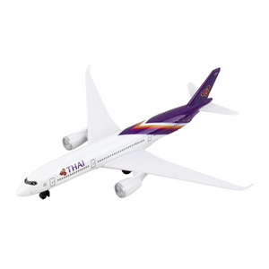 A plastic model toy of a Thai Airways passenger airplane, shown from a three-quarters perspective against a solid white background.