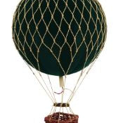 Model of a hot air balloon with a dark green balloon and red basket on a white background