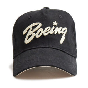 A black baseball cap with the embroidered Boeing logo in gold on the front.