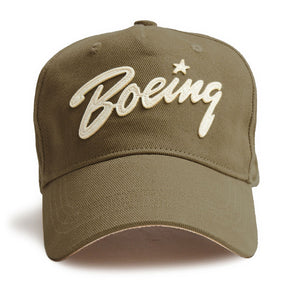 A khaki-colored cap with the embroidered Boeing logo on the front.