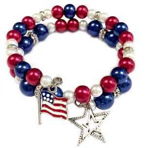 Bracelet with red, white, and blue beads featuring an American flag and star charm on a white background.