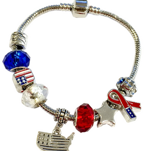 Bracelet with American flag and ribbon charms on a white background