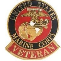 A round pin with the United States Marine Corps Veteran emblem in red, white, and blue.