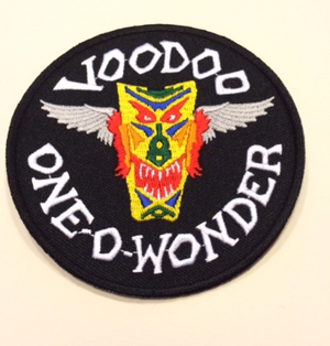 Voodoo One D Wonder patch with colorful face design on a black background