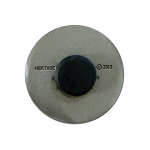 Round metal component with black center and 'Heritage' branding on a white background