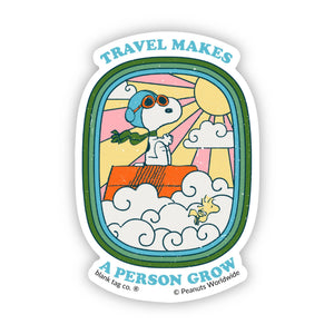 Sticker with cartoon Snoopy character on a cloud, 'Travel Makes a Person Grow' text