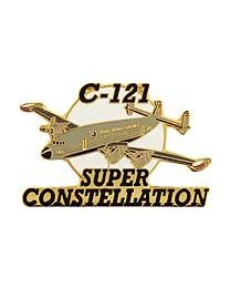 A gold-colored pin shaped like an airplane with the text 'C-121 SUPER CONSTELLATION' on it.