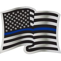 A pin shaped like the American flag with a blue line across the middle.