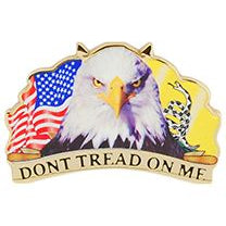 A pin with an emblem featuring a bald eagle and the phrases 'DON'T TREAD ON ME' with the American flag in the background.