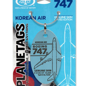 A Boeing 747 Korean Air plane tag with a blue and red design, featuring an illustration of the airplane and the Korean Air logo.