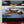 Boxed Corgi Aviation Archive Series diecast model of a Curtiss P-40 E Warhawk with the text '41-24872' and 'Captain Robert H. Vaught, 9th FS, 49th FG, USAAF, Livingstone Field, Australia, 1942' on the packaging.