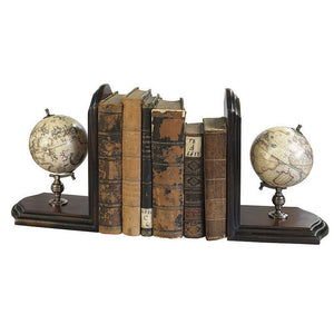 A pair of bookends featuring one terrestrial and one celestial globe on a dark wooden stand, with bronze mountings.