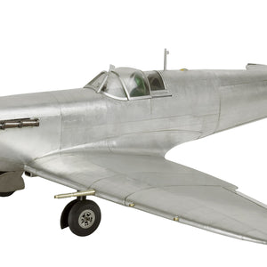 A silver-polished desk model of a Spitfire airplane, featuring a cockpit, wings, and wheels.