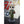 A bobblehead figure of a Tom Cat wearing sunglasses and a military-style pilot suit, standing on a base that resembles an airplane.