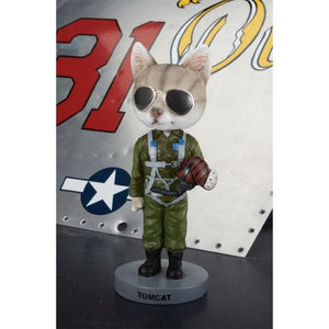A bobblehead figure of a Tom Cat wearing sunglasses and a military-style pilot suit, standing on a base that resembles an airplane.
