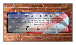 A poster featuring the American flag and textual prayers and Bible verses, displayed on a brick wall.