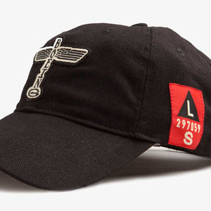 A black cap with a Boeing logo, a red Canoe shield, and a woven U.S.A flag on the back.