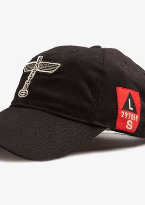 A black cap with a Boeing logo, a red Canoe shield, and a woven U.S.A flag on the back.