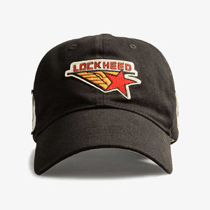 A black cap with a Lockheed direct logo embroidery on a felt patch.