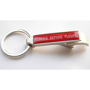 A chrome metal keyring with a red 'REMOVE BEFORE FLIGHT' label and a stainless steel ring holder.